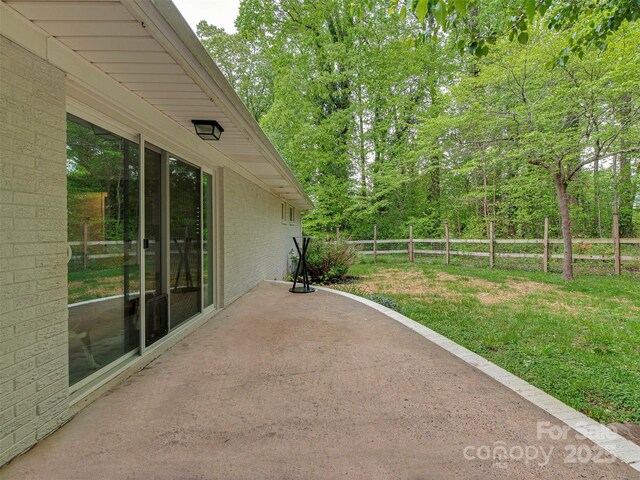 7048 Delta Lake Dr, Charlotte, NC 28215 - view of patio featuring fence