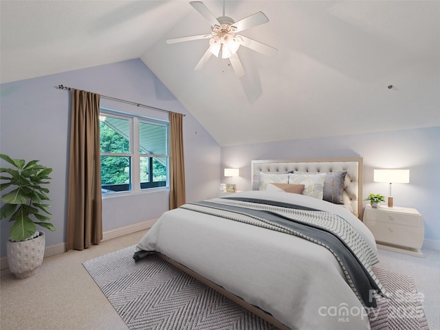 234 Bird Creek Dr, Waynesville, NC 28786 - bedroom with light colored carpet, vaulted ceiling, baseboards, and a ceiling fan