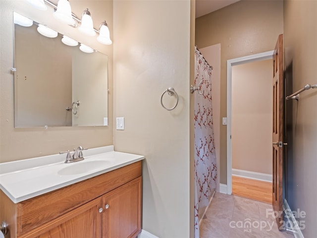 234 Bird Creek Dr, Waynesville, NC 28786 - full bathroom with vanity, tile patterned flooring, baseboards, and curtained shower