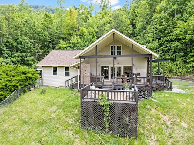 234 Bird Creek Dr, Waynesville, NC 28786 - back of house with a deck, a ceiling fan, and a forest view