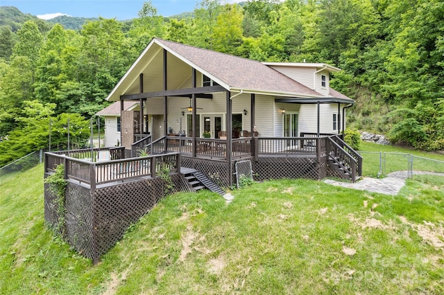 234 Bird Creek Dr, Waynesville, NC 28786 - chalet / cabin with a wooden deck, a wooded view, a gate, and roof with shingles