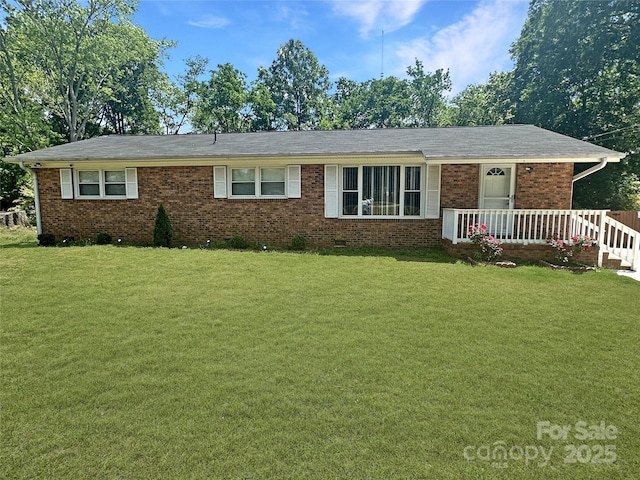 1121 Rembrandt Dr SW, Concord, NC 28027 - ranch-style house featuring a front yard and brick siding