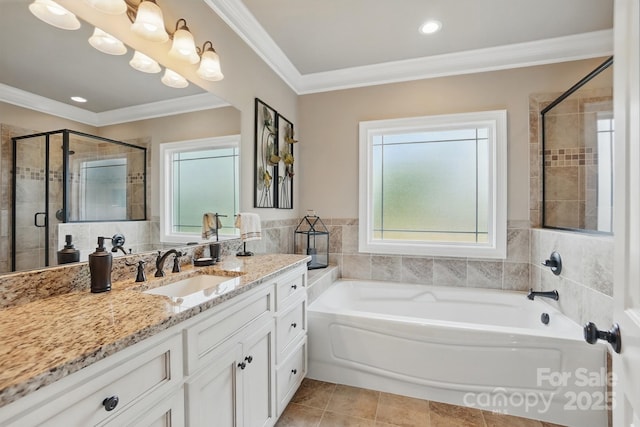 full bathroom with tile patterned floors, a stall shower, a garden tub, vanity, and ornamental molding
