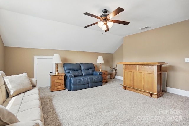 living area with lofted ceiling, visible vents, ceiling fan, and light colored carpet