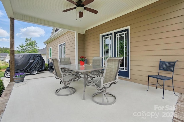 view of patio / terrace featuring a ceiling fan and outdoor dining space
