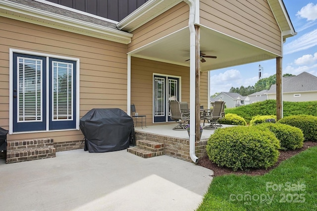 view of patio / terrace with ceiling fan and a grill