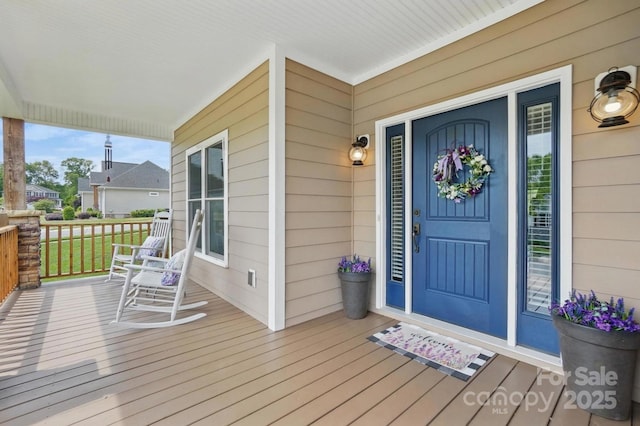 property entrance with a porch