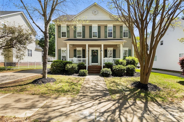 18838 Oakhurst Blvd, Cornelius, NC 28031 - greek revival house with a porch and fence