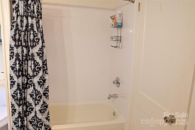 full bathroom with shower / tub combo with curtain