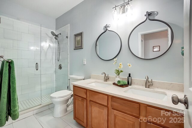 517 Bertram Rd, Fort Mill, SC 29708 - bathroom with toilet, a sink, and a shower stall