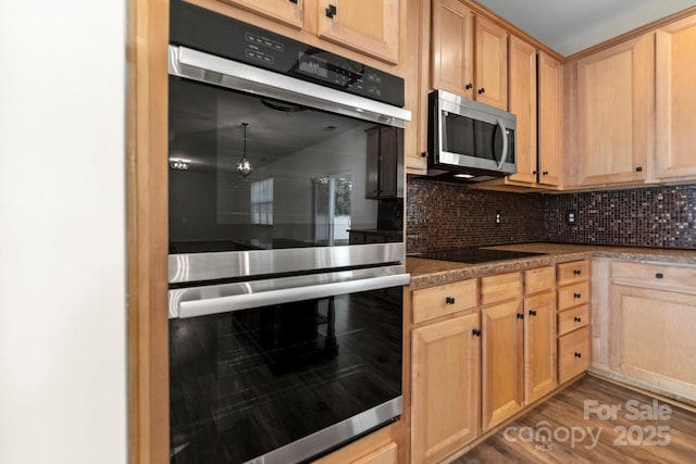 15814 Herring Gull Way, Charlotte, NC 28278 - kitchen with light brown cabinets, wood finished floors, stainless steel appliances, and tasteful backsplash