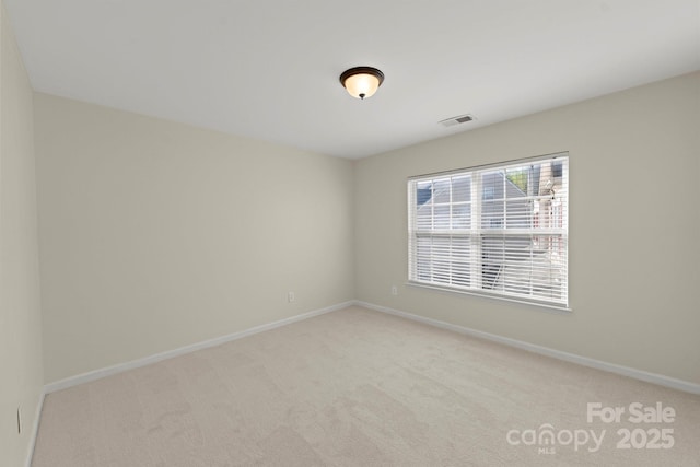 15814 Herring Gull Way, Charlotte, NC 28278 - empty room featuring baseboards, visible vents, and carpet