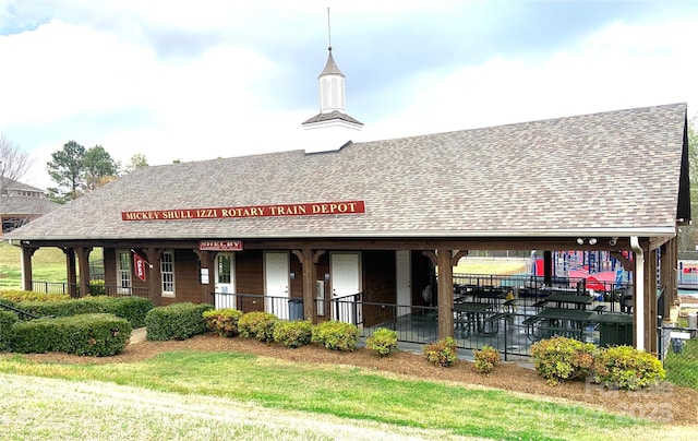 view of building exterior featuring fence