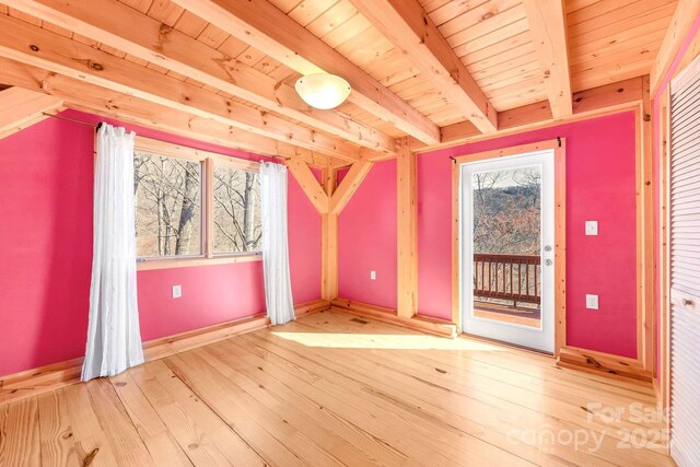 35 Great Aspen Way, Black Mountain, NC 28711 - empty room featuring light wood-style flooring and a wood ceiling with exposed beams