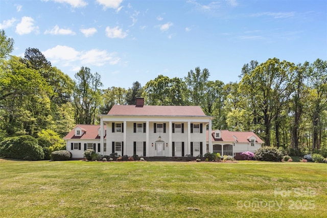 1233 General Hoke Dr, Lincolnton, NC 28092 - neoclassical / greek revival house with a front lawn and a chimney