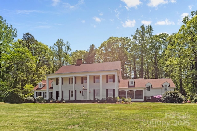 1233 General Hoke Dr, Lincolnton, NC 28092 - view of front of house featuring a chimney and a front lawn