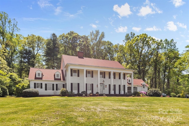 1233 General Hoke Dr, Lincolnton, NC 28092 - greek revival house featuring a front yard and a porch