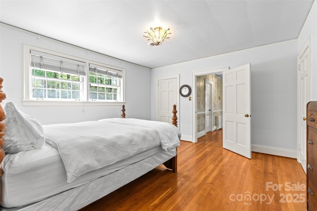 1233 General Hoke Dr, Lincolnton, NC 28092 - bedroom featuring baseboards and light wood-style floors