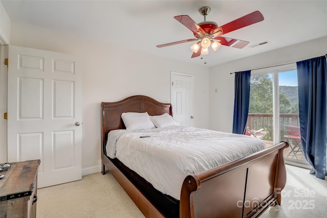 bedroom featuring ceiling fan, visible vents, light carpet, access to exterior, and baseboards