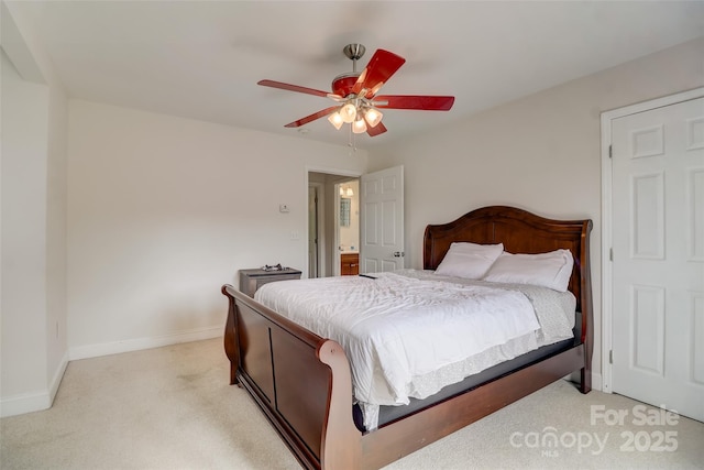 bedroom featuring ceiling fan, light colored carpet, and baseboards
