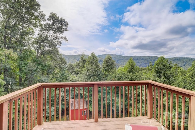 wooden terrace with a mountain view