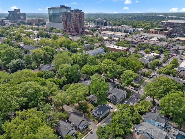 birds eye view of property with a view of city