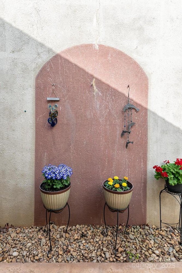 exterior details featuring stucco siding