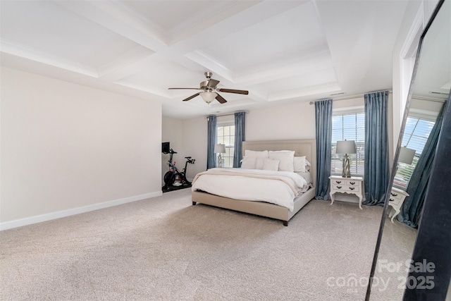 bedroom featuring light colored carpet, beam ceiling, coffered ceiling, a ceiling fan, and baseboards