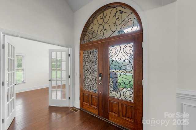 1012 Harper Lee Dr, Newton, NC 28658 - entryway featuring dark wood-style floors, high vaulted ceiling, baseboards, and french doors