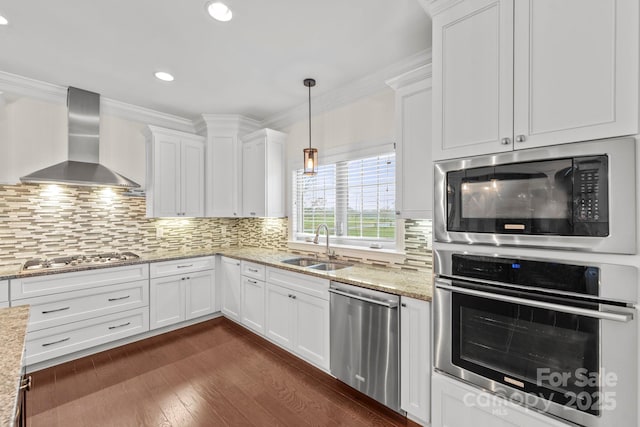1012 Harper Lee Dr, Newton, NC 28658 - kitchen with a sink, wall chimney exhaust hood, stainless steel appliances, decorative backsplash, and dark wood-style flooring