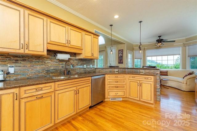 59 Carriage Highlands Ct, Hendersonville, NC 28791 - kitchen featuring a sink, ornamental molding, light wood-type flooring, open floor plan, and stainless steel dishwasher