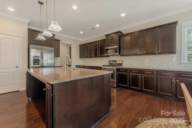13311 Union Square Dr, Huntersville, NC 28078 - kitchen with a sink, dark brown cabinets, dark wood-type flooring, and stainless steel appliances