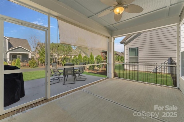 13311 Union Square Dr, Huntersville, NC 28078 - unfurnished sunroom featuring plenty of natural light, outdoor dining area, and a ceiling fan