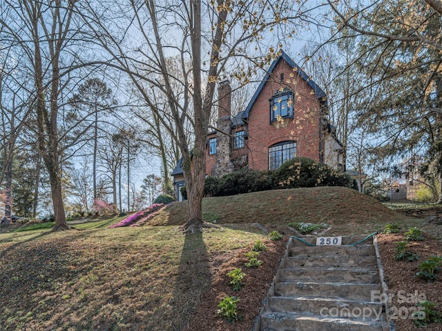 250 Kimberly Ave, Asheville, NC 28804 - view of front facade featuring brick siding
