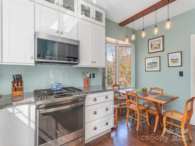 250 Kimberly Ave, Asheville, NC 28804 - kitchen with stone countertops, dark wood-style floors, beamed ceiling, and stainless steel appliances
