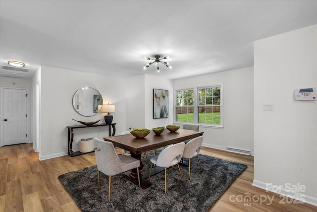 4932 Delivau Dr, Charlotte, NC 28215 - dining room with light wood-style flooring