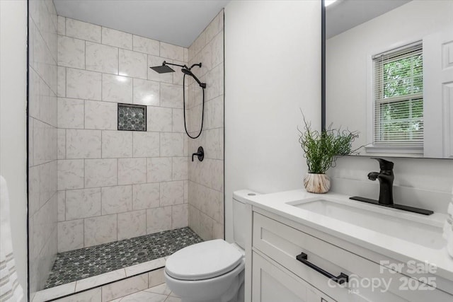 4932 Delivau Dr, Charlotte, NC 28215 - bathroom featuring vanity and tiled shower