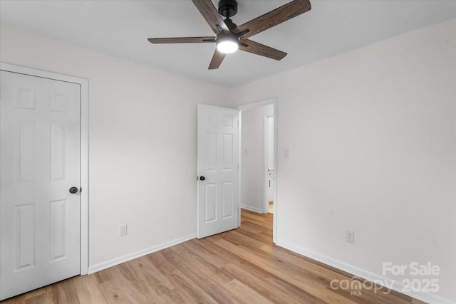 4932 Delivau Dr, Charlotte, NC 28215 - unfurnished bedroom featuring light wood-style flooring and ceiling fan