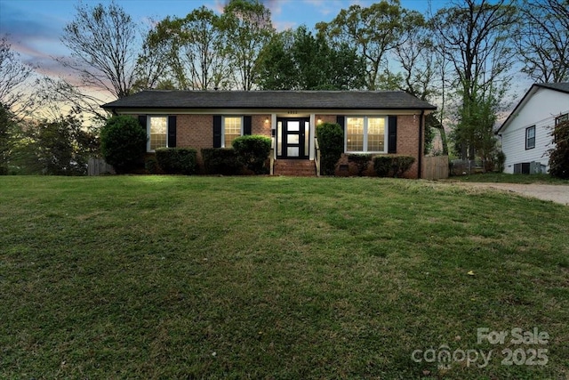 4932 Delivau Dr, Charlotte, NC 28215 - single story home featuring brick siding and a yard