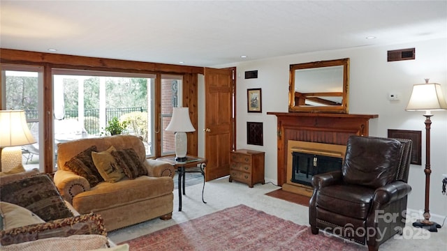 4 Dogwood Rd, Asheville, NC 28804 - living room featuring a fireplace with flush hearth, a wealth of natural light, and visible vents