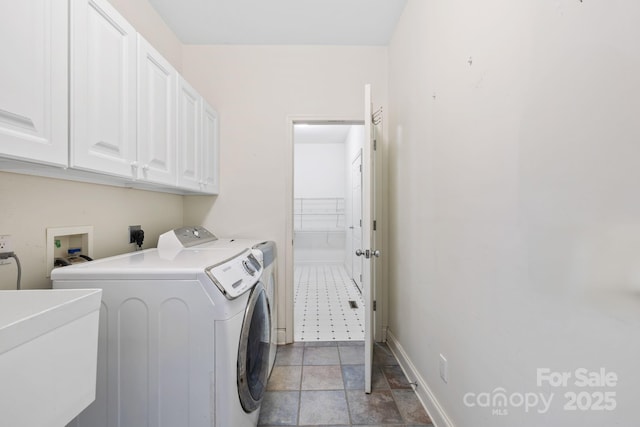 101 Skyview Dr, Asheville, NC 28804 - laundry room featuring cabinet space, washer and dryer, and baseboards