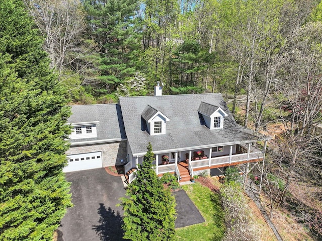 101 Skyview Dr, Asheville, NC 28804 - view of front of house featuring covered porch, asphalt driveway, a chimney, an attached garage, and a shingled roof