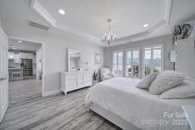 bedroom with stainless steel fridge with ice dispenser, visible vents, a raised ceiling, a notable chandelier, and crown molding