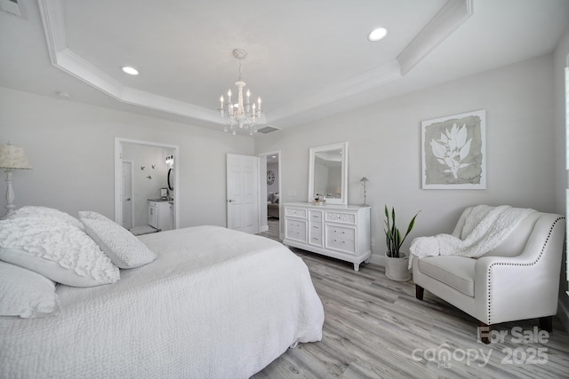 bedroom featuring a raised ceiling, a chandelier, crown molding, recessed lighting, and light wood-style flooring