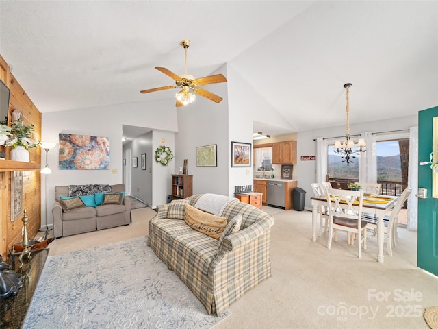 364 Blevins Knob Dr, Burnsville, NC 28714 - living room featuring light colored carpet, high vaulted ceiling, and ceiling fan with notable chandelier