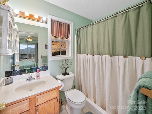 364 Blevins Knob Dr, Burnsville, NC 28714 - bathroom with connected bathroom, toilet, curtained shower, vanity, and a textured ceiling