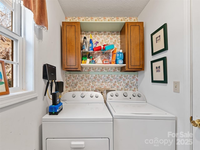 364 Blevins Knob Dr, Burnsville, NC 28714 - laundry area with cabinet space, washing machine and dryer, and a textured ceiling