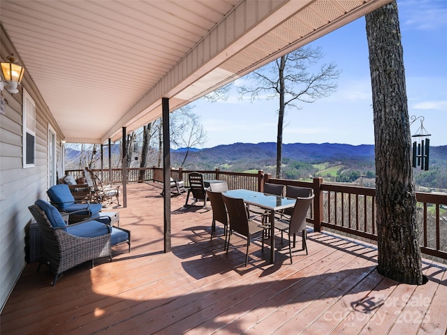 364 Blevins Knob Dr, Burnsville, NC 28714 - deck featuring outdoor dining area and a mountain view