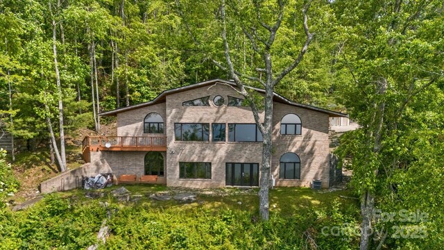 212 Chestnut Forest Rd, Fairview, NC 28730 - view of home's exterior featuring a view of trees
