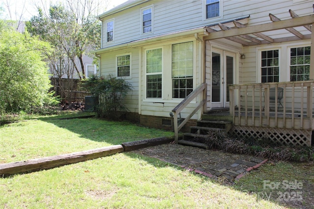 9915 Lottie Ln, Charlotte, NC 28262 - exterior space with fence, a wooden deck, french doors, a pergola, and a lawn